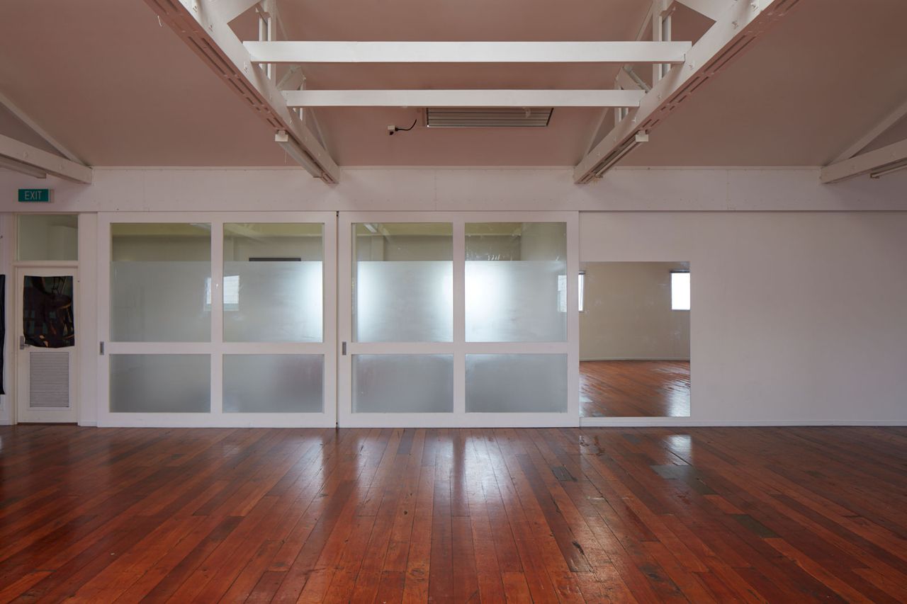  Opanuku Studios, sliding doors closed, and mirror
